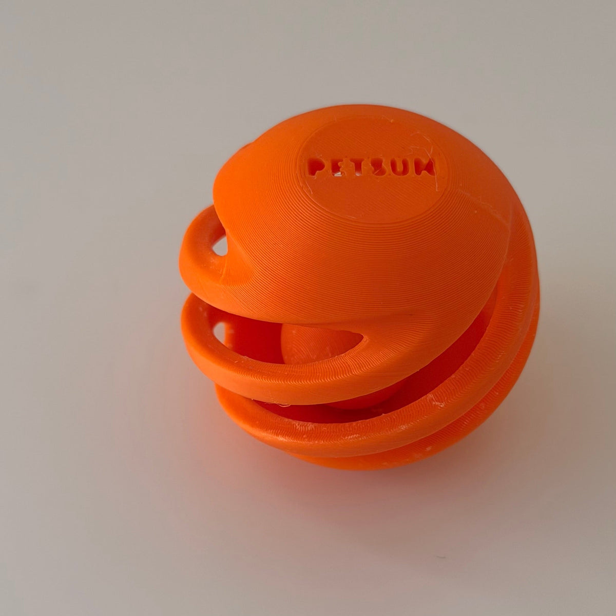 Ball-in-ball interactive toy for cats and small dogs, Orange SpinCore design